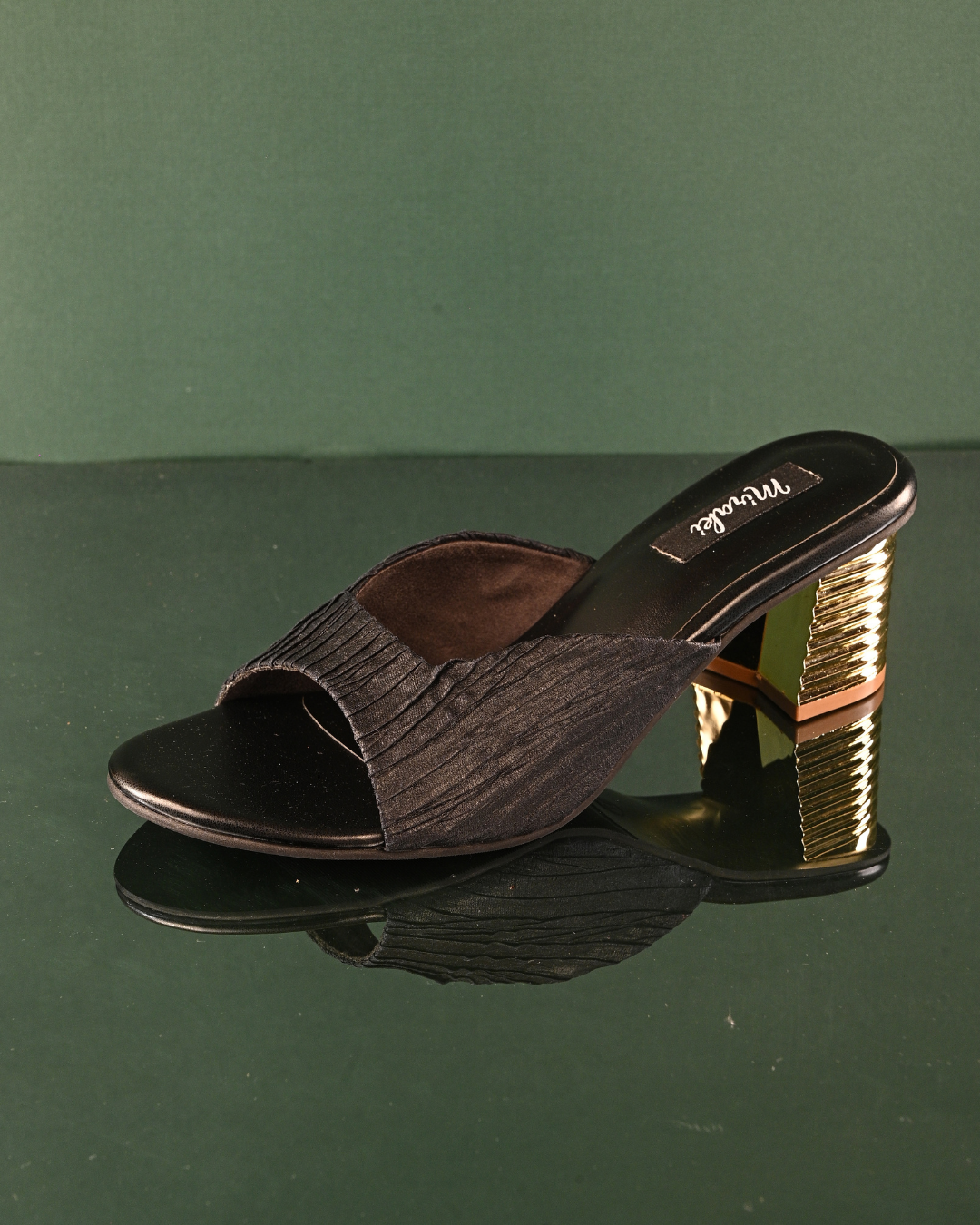 Textured Black Slip Ons With Gold Heels