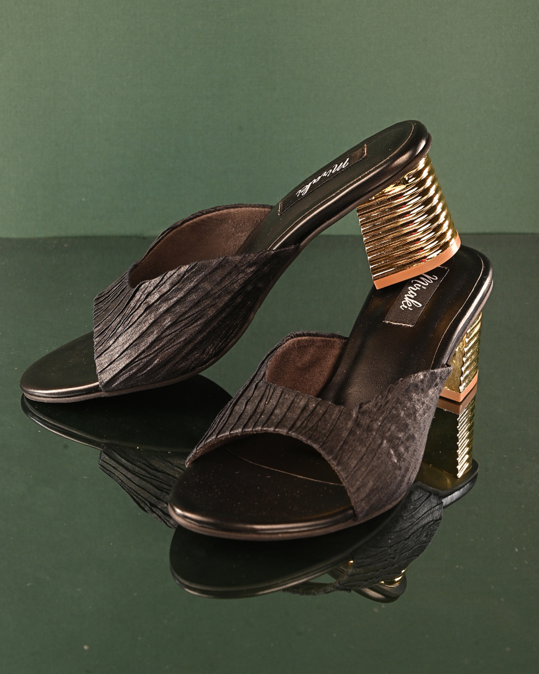 Textured Black Slip Ons With Gold Heels