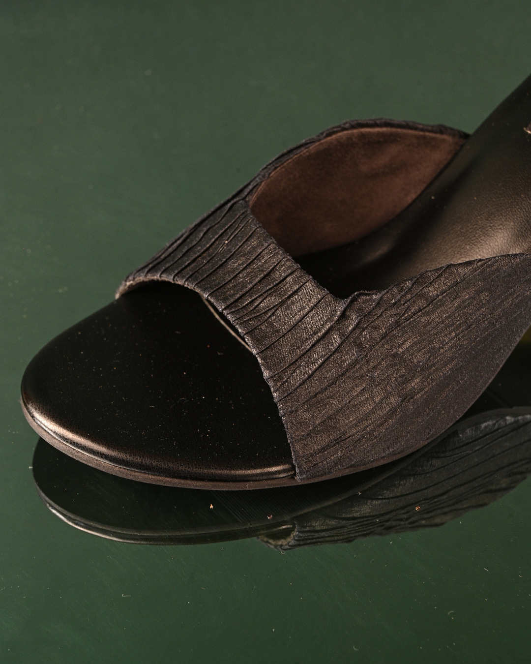 Textured Black Slip Ons With Gold Heels