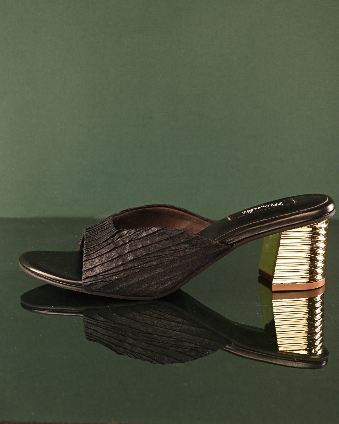 Textured Black Slip Ons With Gold Heels