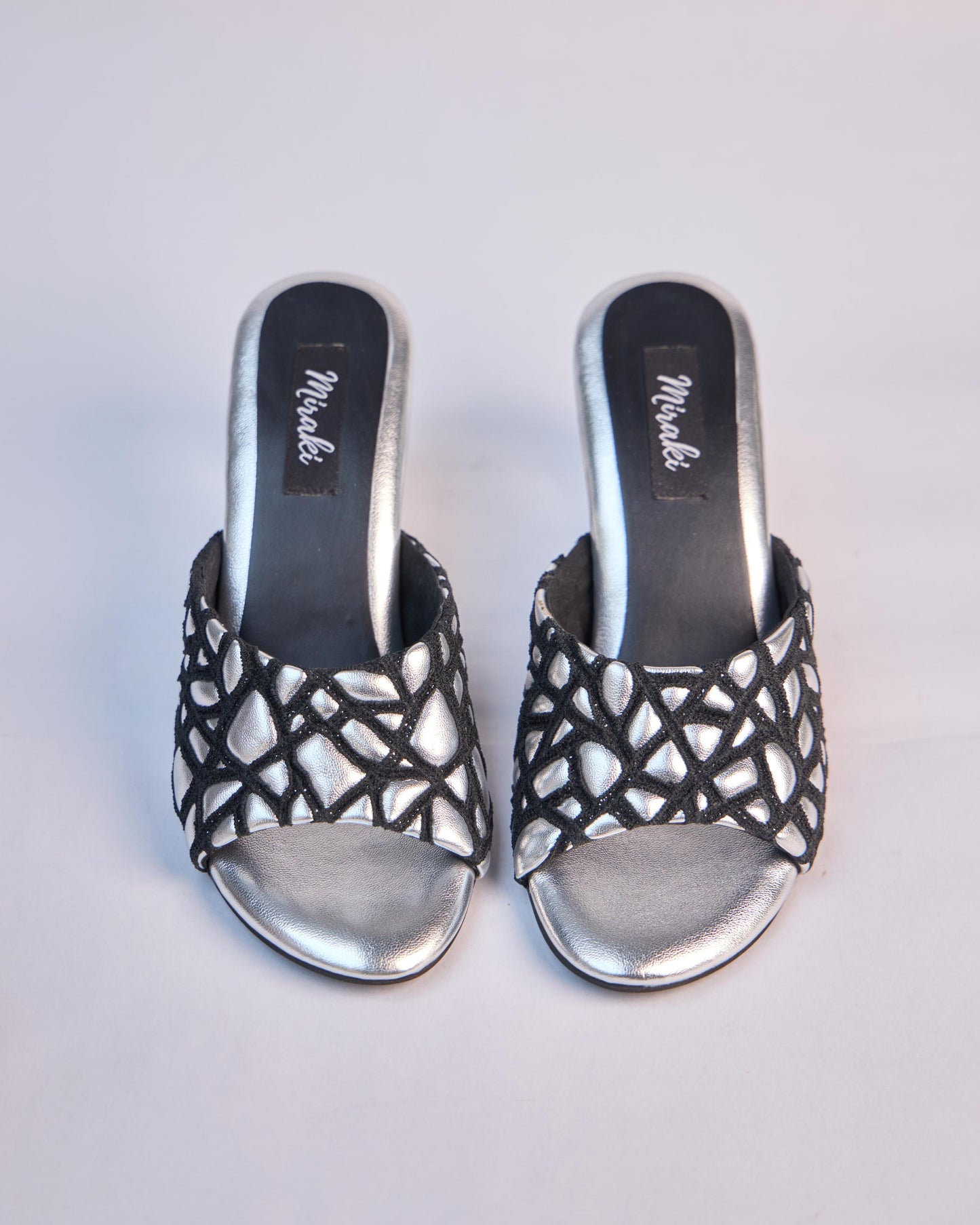 Webbed Silver Sandals With Unique Round Heels