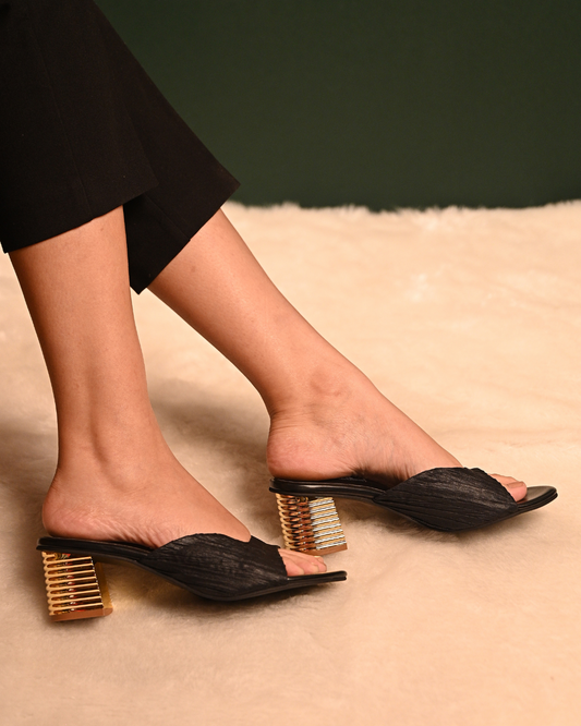 Textured Black Slip Ons With Gold Heels